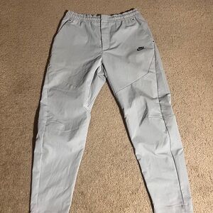 Nike tech woven commuter pants